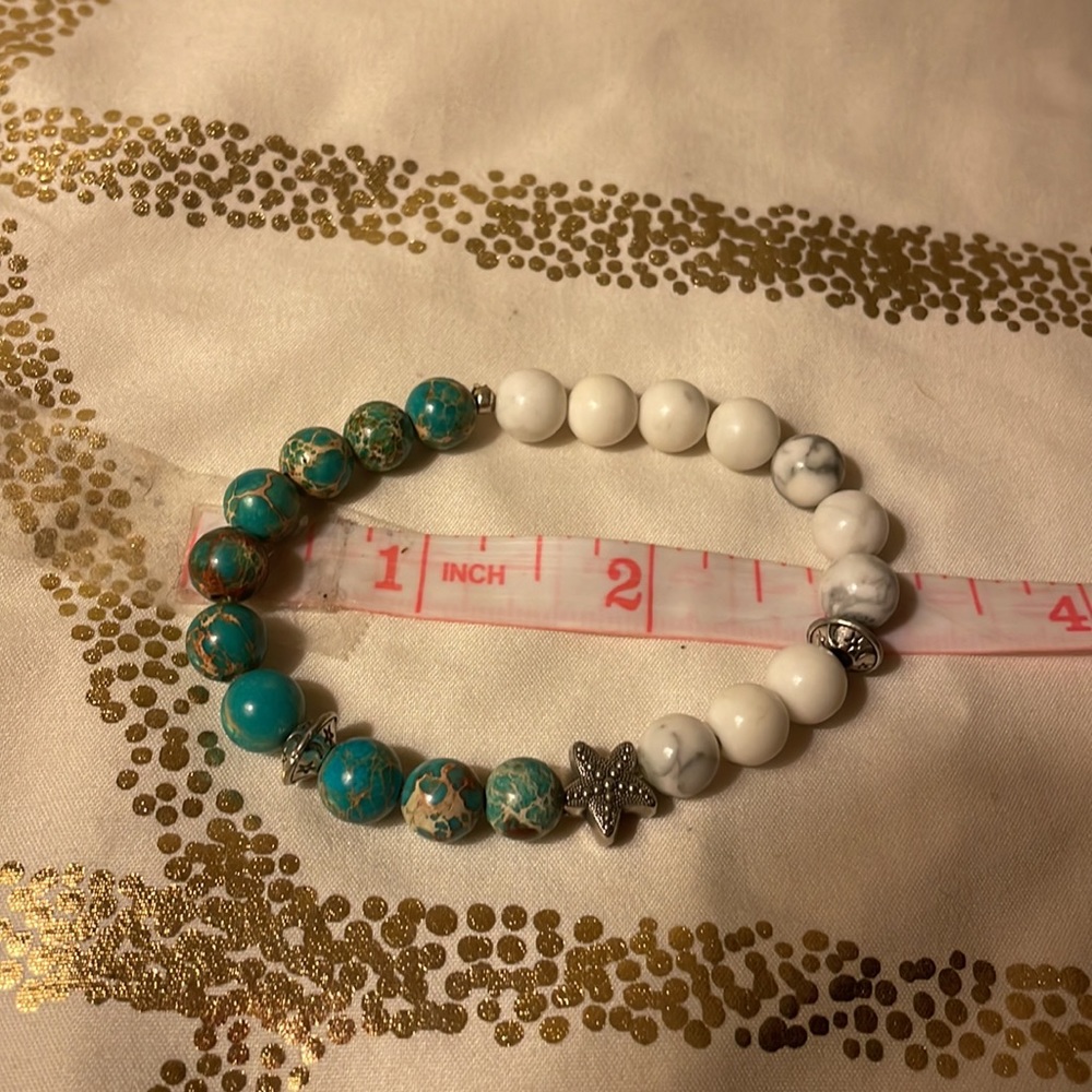 Elastic bracelet with white and teal beads with starfish bead - Picture 5 of 5